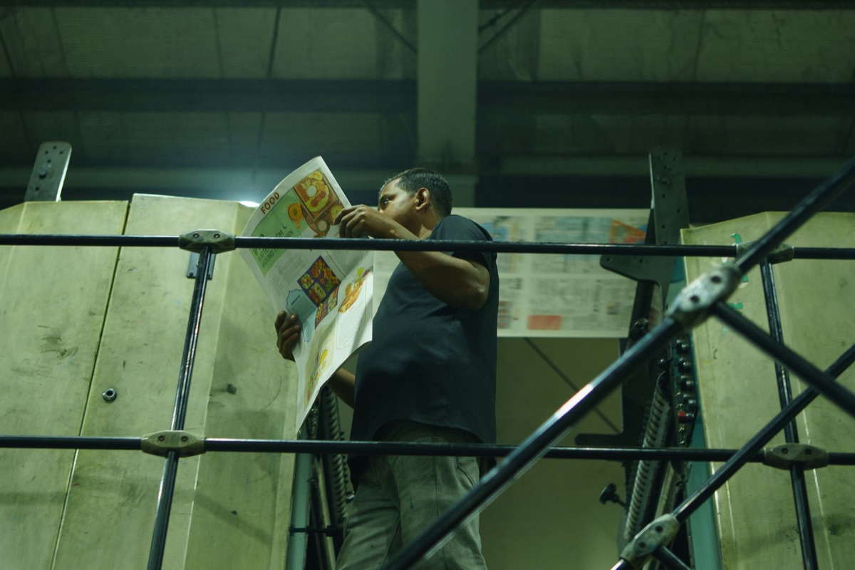 Person reviewing printed documents